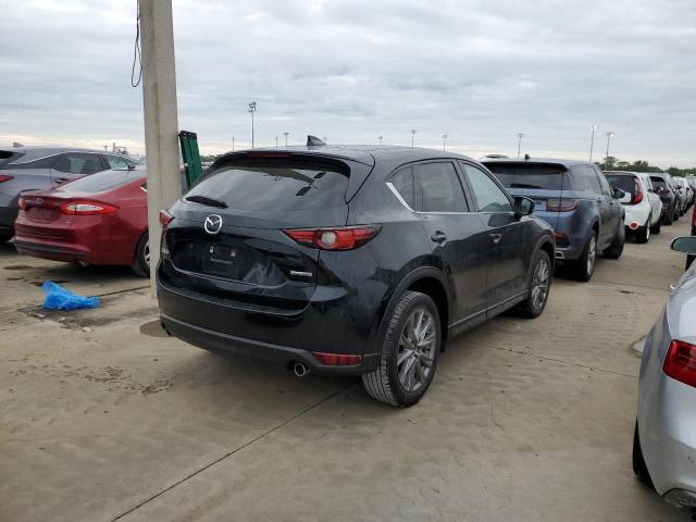 2021 MAZDA CX-5 GRAND TOURING VIN: JM3KFA***********