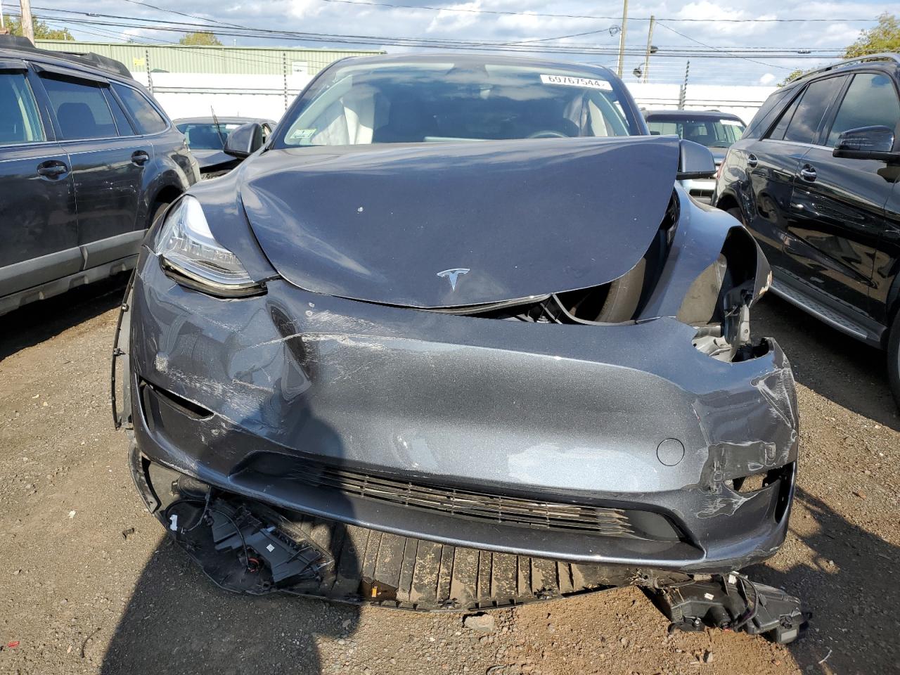 2023 TESLA MODEL Y  VIN:7SAYGDEE7PA037276