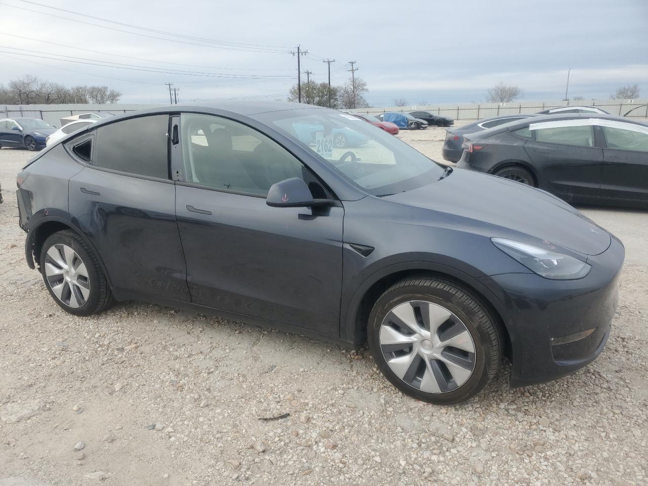 2024 TESLA MODEL Y  VIN:7SAYGDEE1RA235662