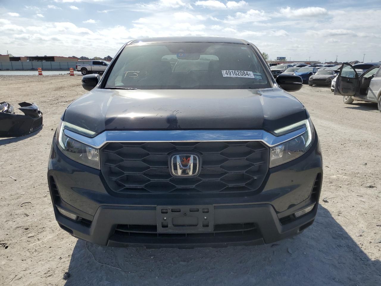 2023 HONDA PASSPORT EXL VIN:5FNYF8H51PB028174
