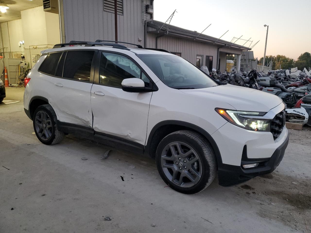 2023 HONDA PASSPORT EXL VIN:5FNYF8H54PB009876