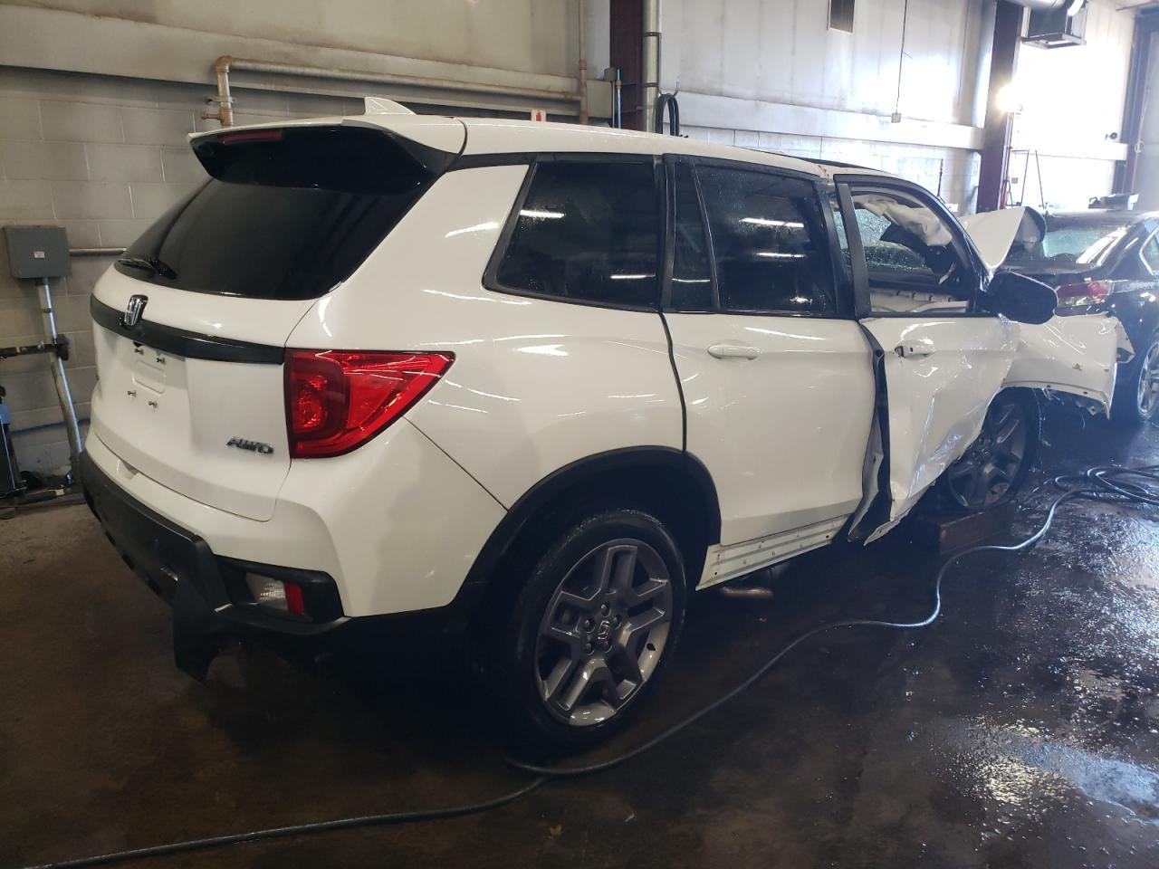 2023 HONDA PASSPORT EXL VIN:5FNYF8H52PB024554