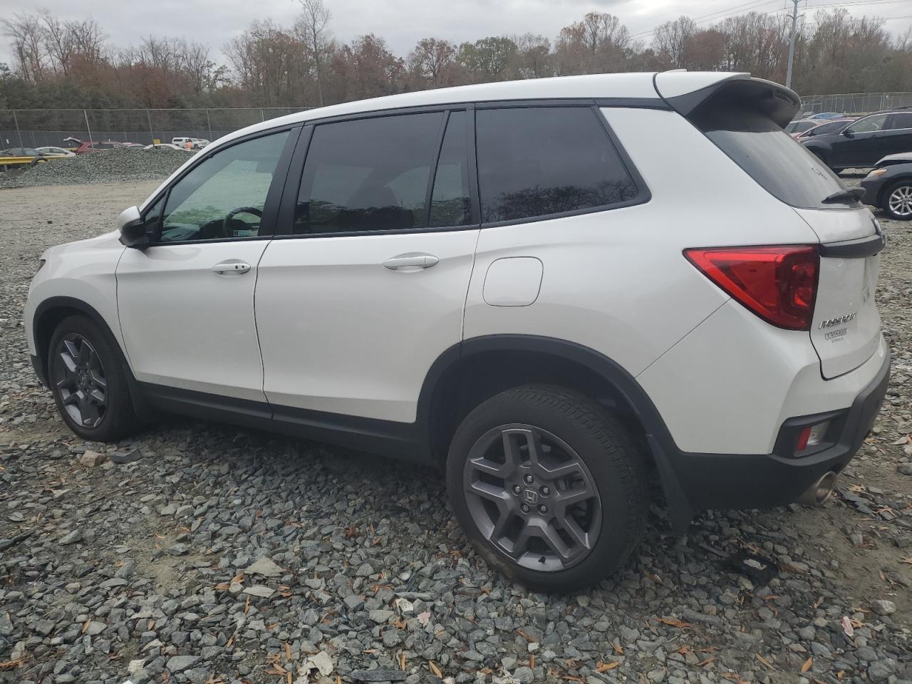 2023 HONDA PASSPORT EXL VIN:5FNYF8H50PB040929