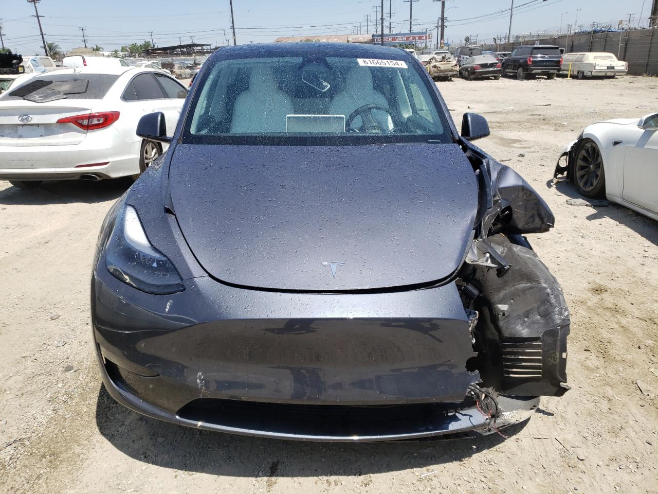 2023 TESLA MODEL Y  VIN:7SAYGDEF7PF900623