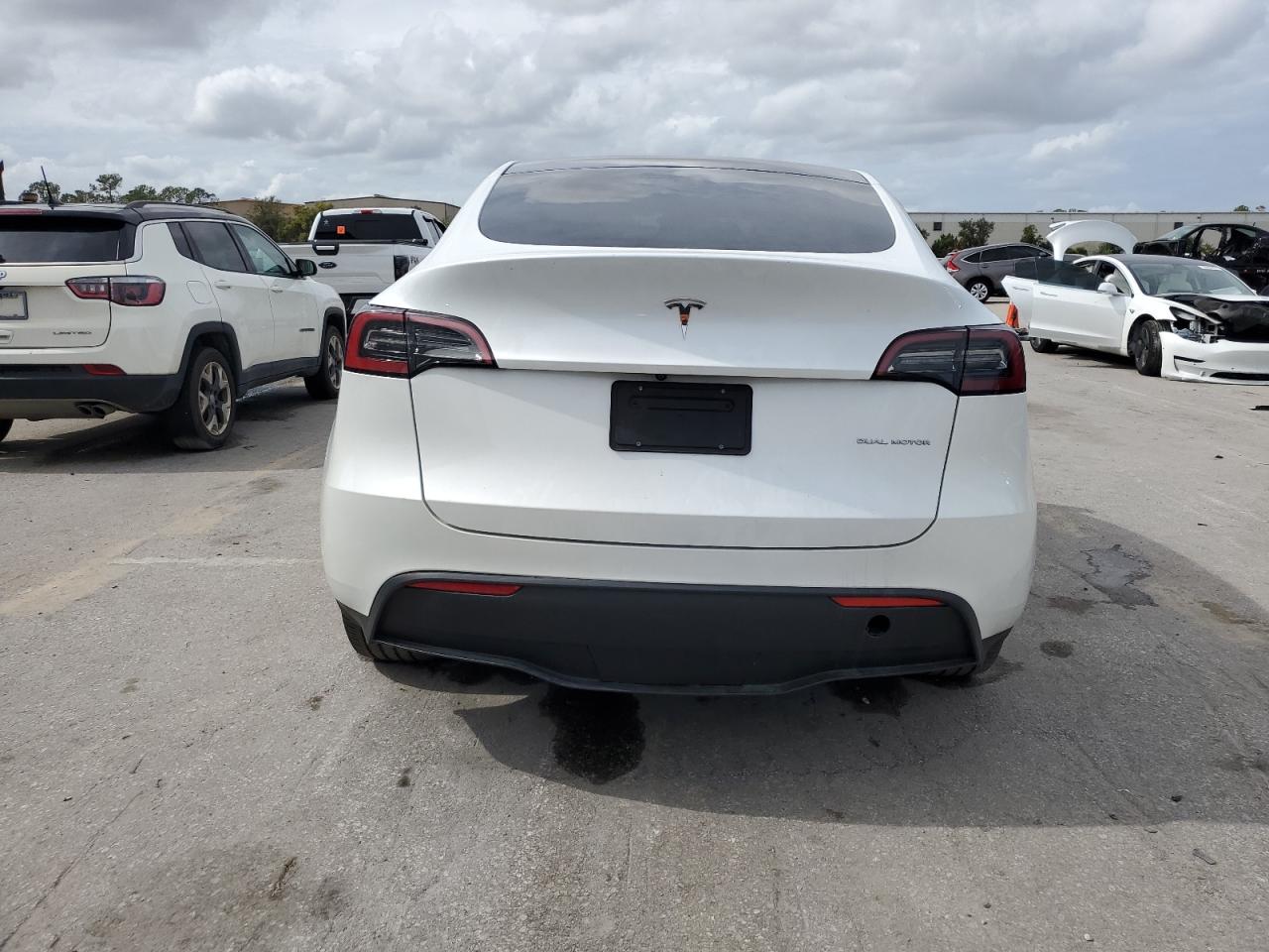 2023 TESLA MODEL Y  VIN:7SAYGDEF2PA049599