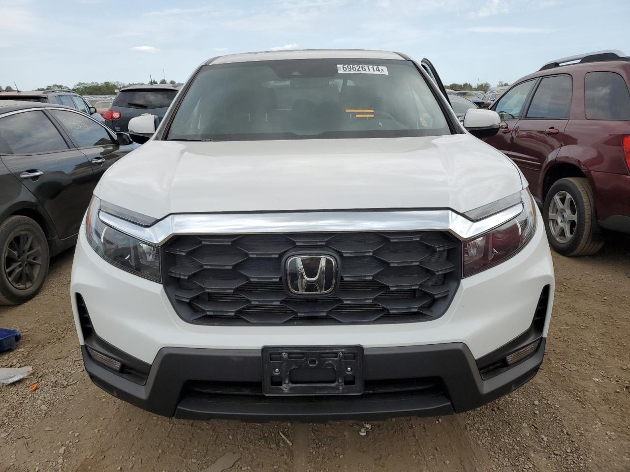 2023 HONDA PASSPORT EXL VIN:5FNYF8H57PB038112