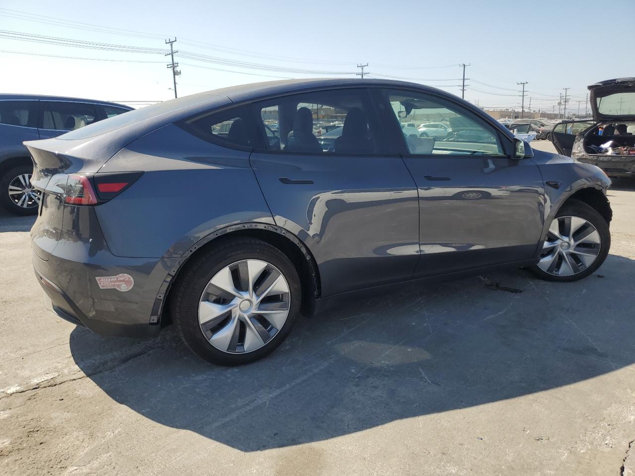 2023 TESLA MODEL Y  VIN:7SAYGDEE1PF938372