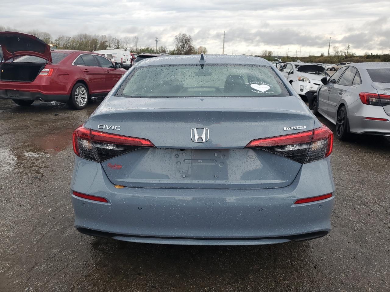 2023 HONDA CIVIC TOURING VIN:2HGFE1F91PH303030