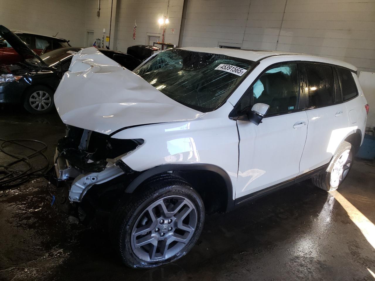 2023 HONDA PASSPORT EXL VIN:5FNYF8H52PB024554