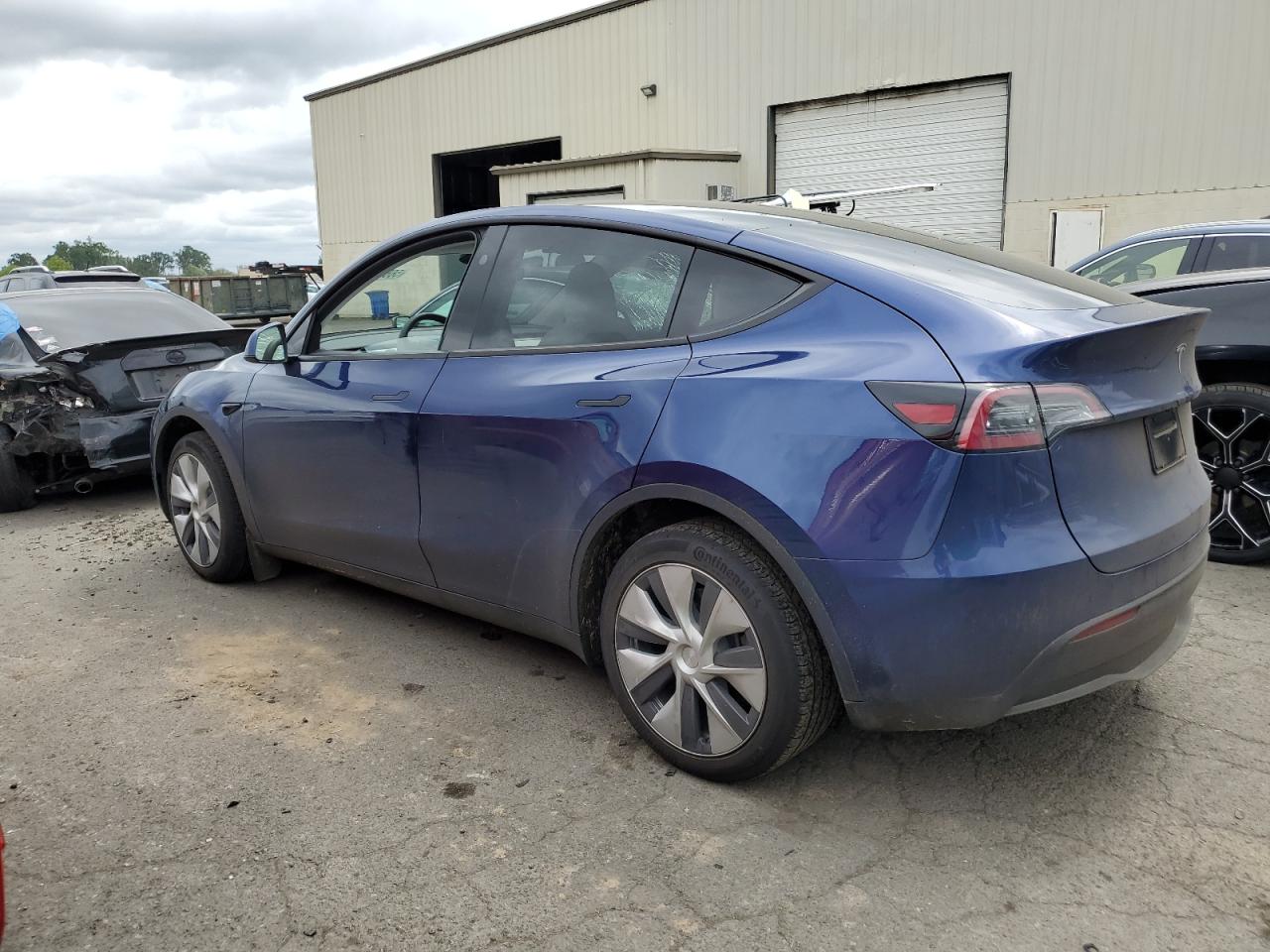 2023 TESLA MODEL Y  VIN:7SAYGDEE7PF907143