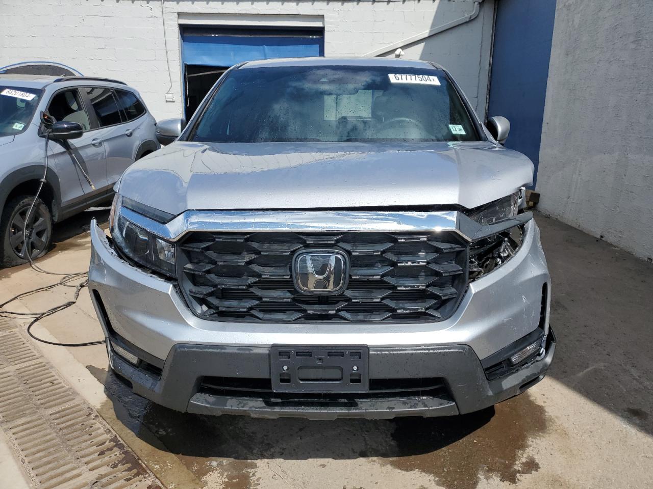 2023 HONDA PASSPORT EXL VIN:5FNYF8H53PB043694