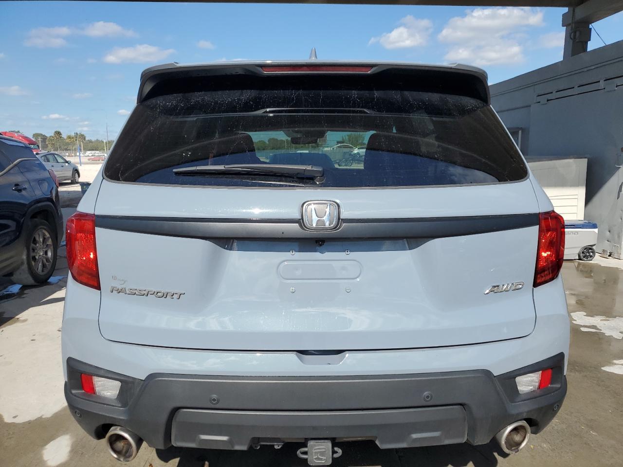 2023 HONDA PASSPORT EXL VIN:5FNYF8H54PB021316