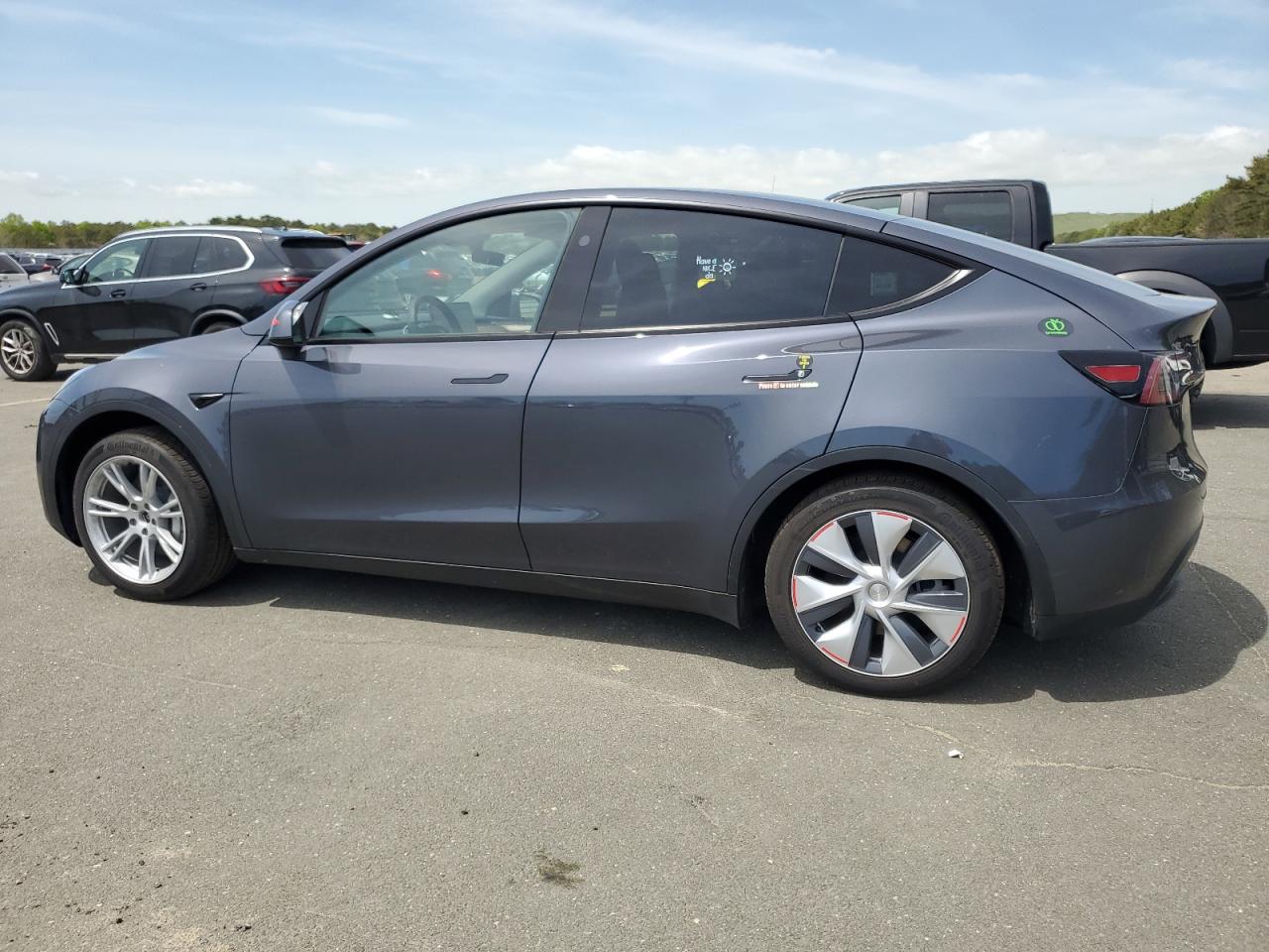 2023 TESLA MODEL Y  VIN:7SAYGAEE6PF909657