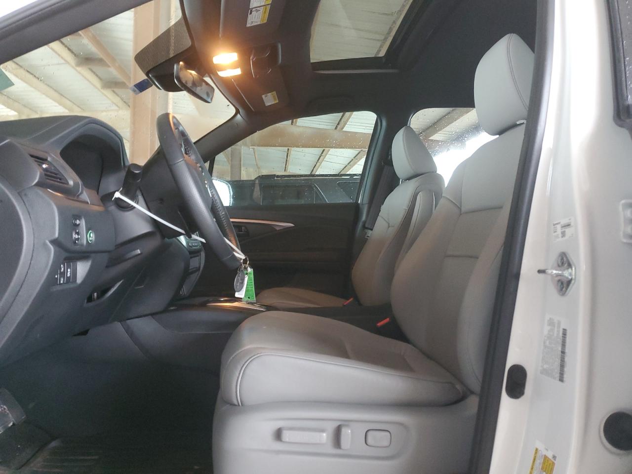 2023 HONDA PASSPORT EXL VIN:5FNYF8H57PB029779