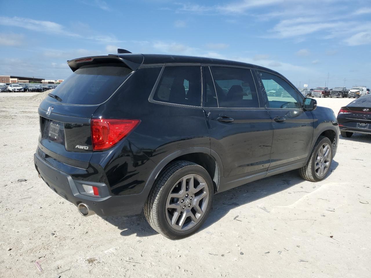 2023 HONDA PASSPORT EXL VIN:5FNYF8H51PB028174