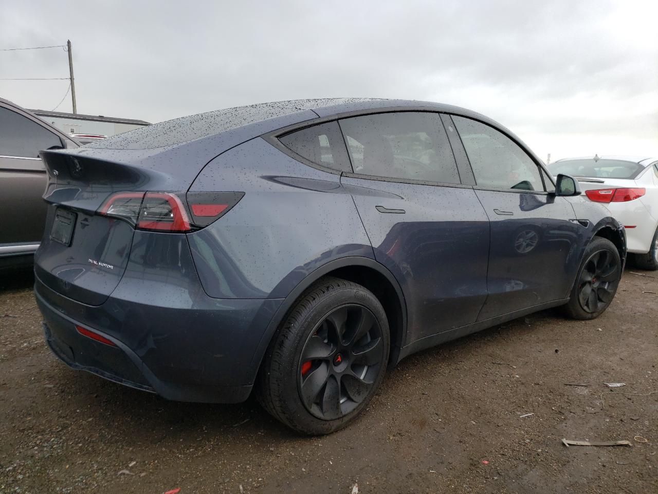 2023 TESLA MODEL Y  VIN:7SAYGAEE0PF703086