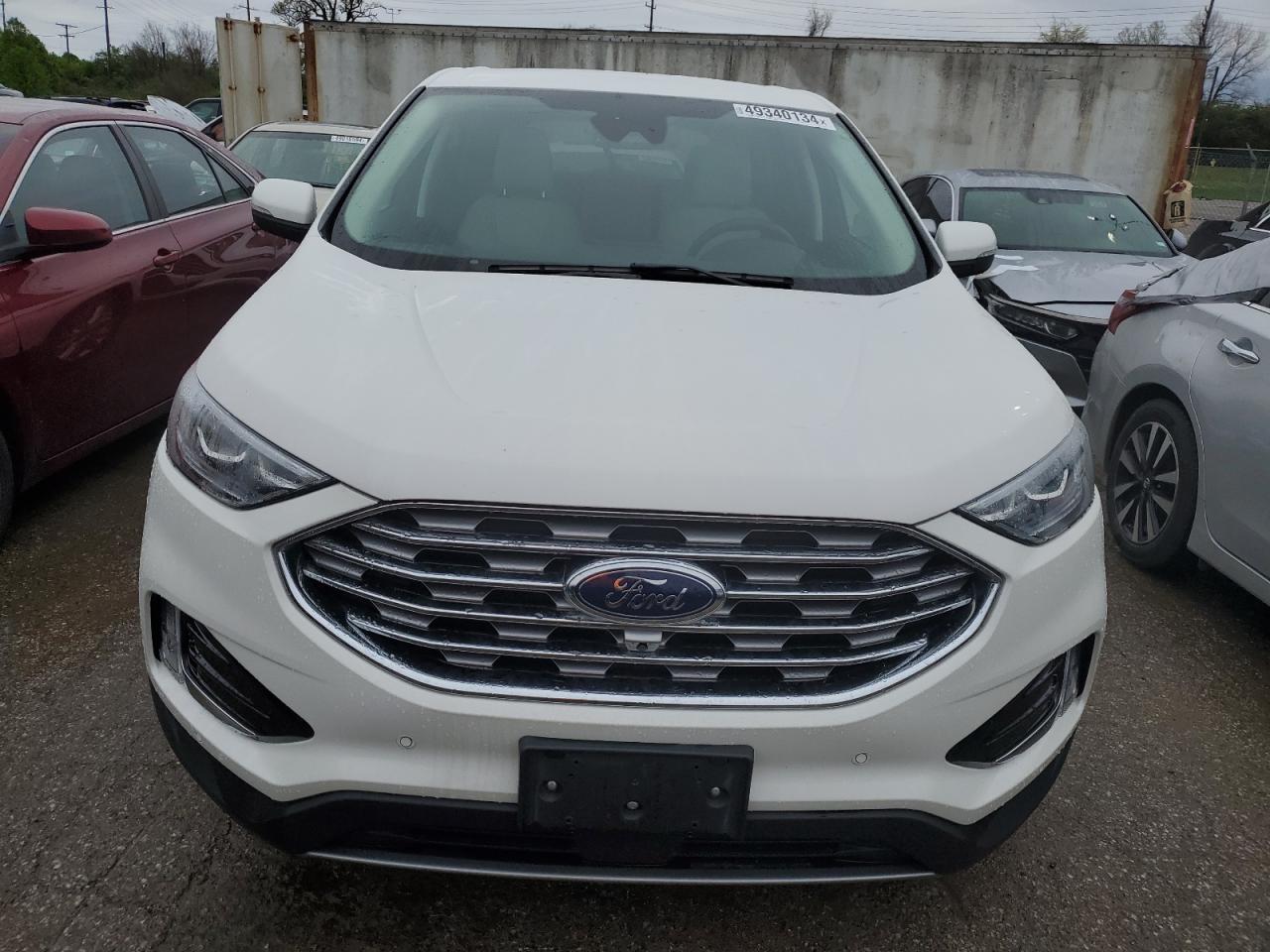 2022 FORD EDGE TITANIUM VIN:2FMPK4K91NBA00487