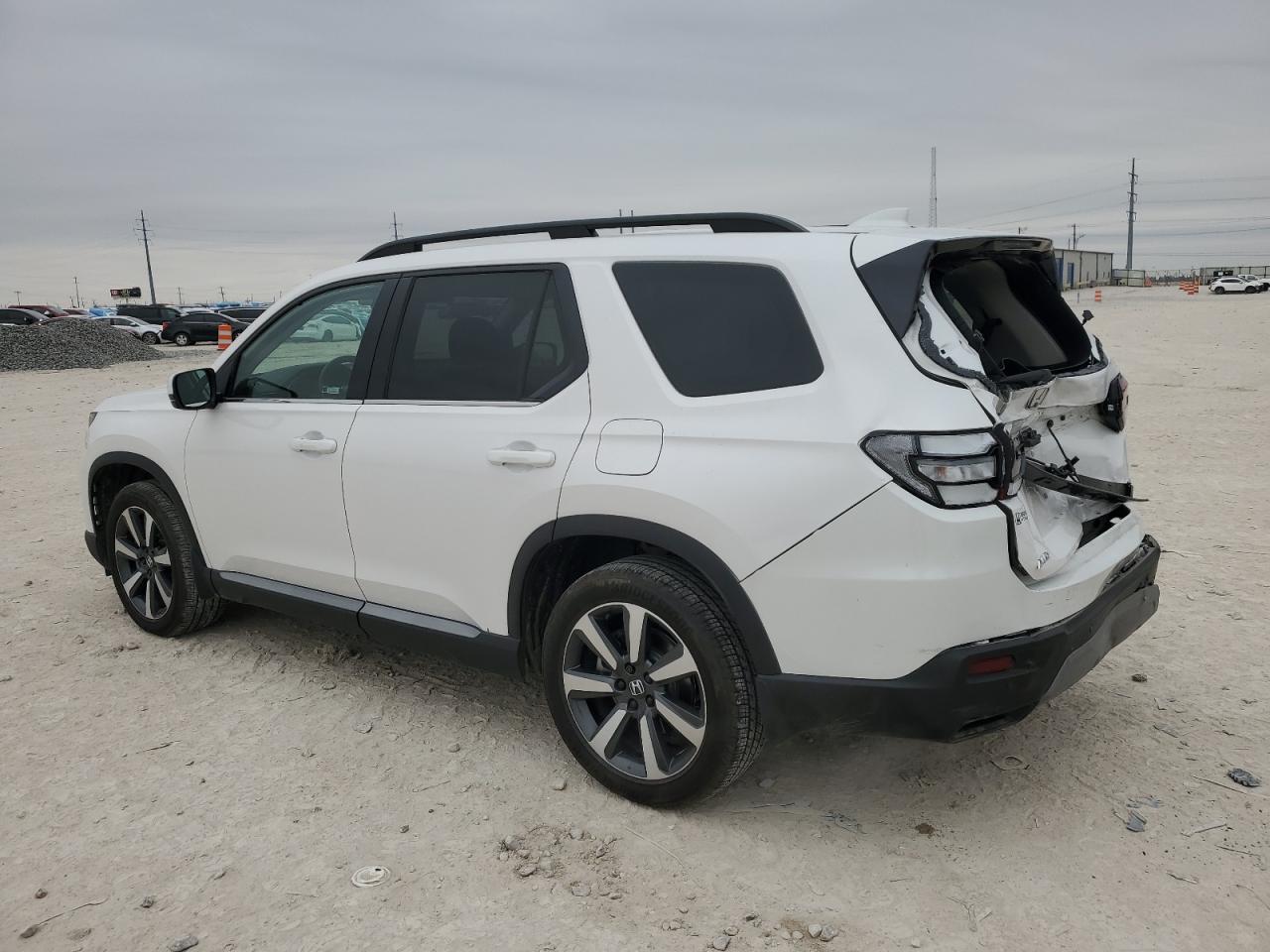 2024 HONDA PILOT TOURING VIN:5FNYG1H70RB002528