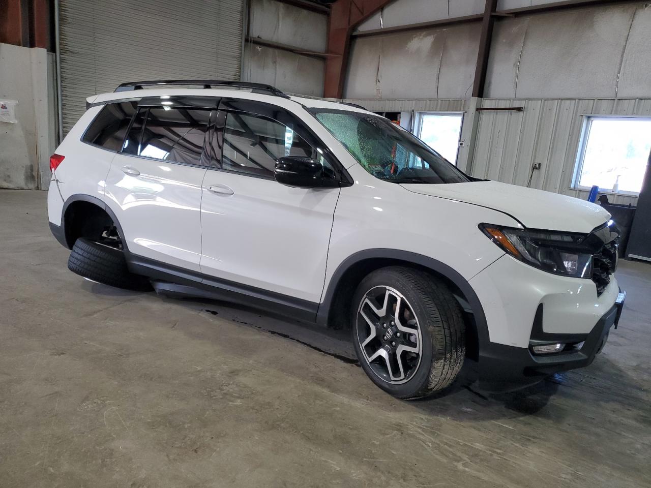 2023 HONDA PASSPORT ELITE VIN:5FNYF8H09PB010588