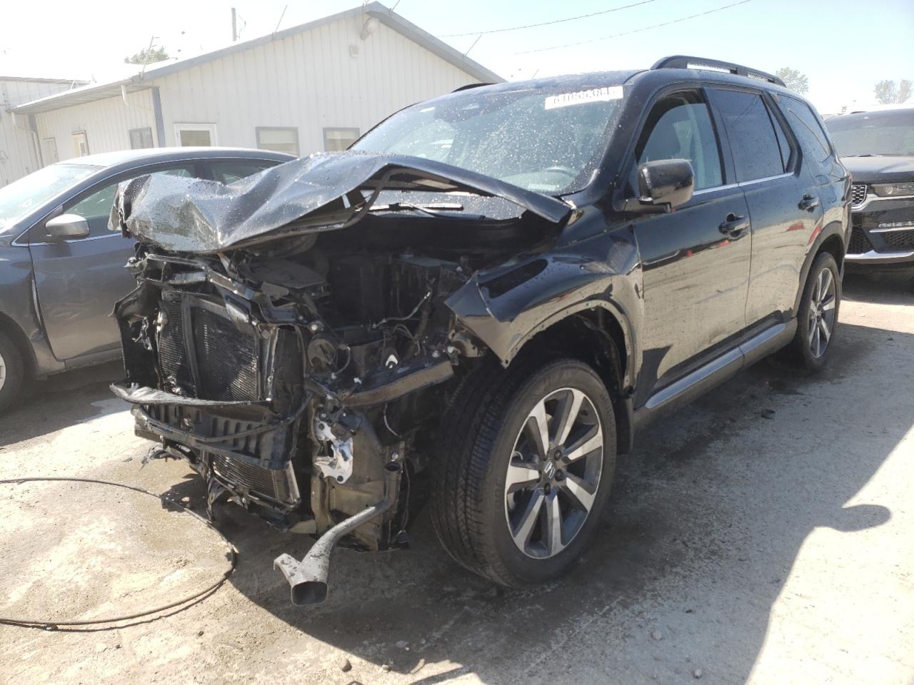 2024 HONDA PILOT TOURING VIN:5FNYG1H76RB007782