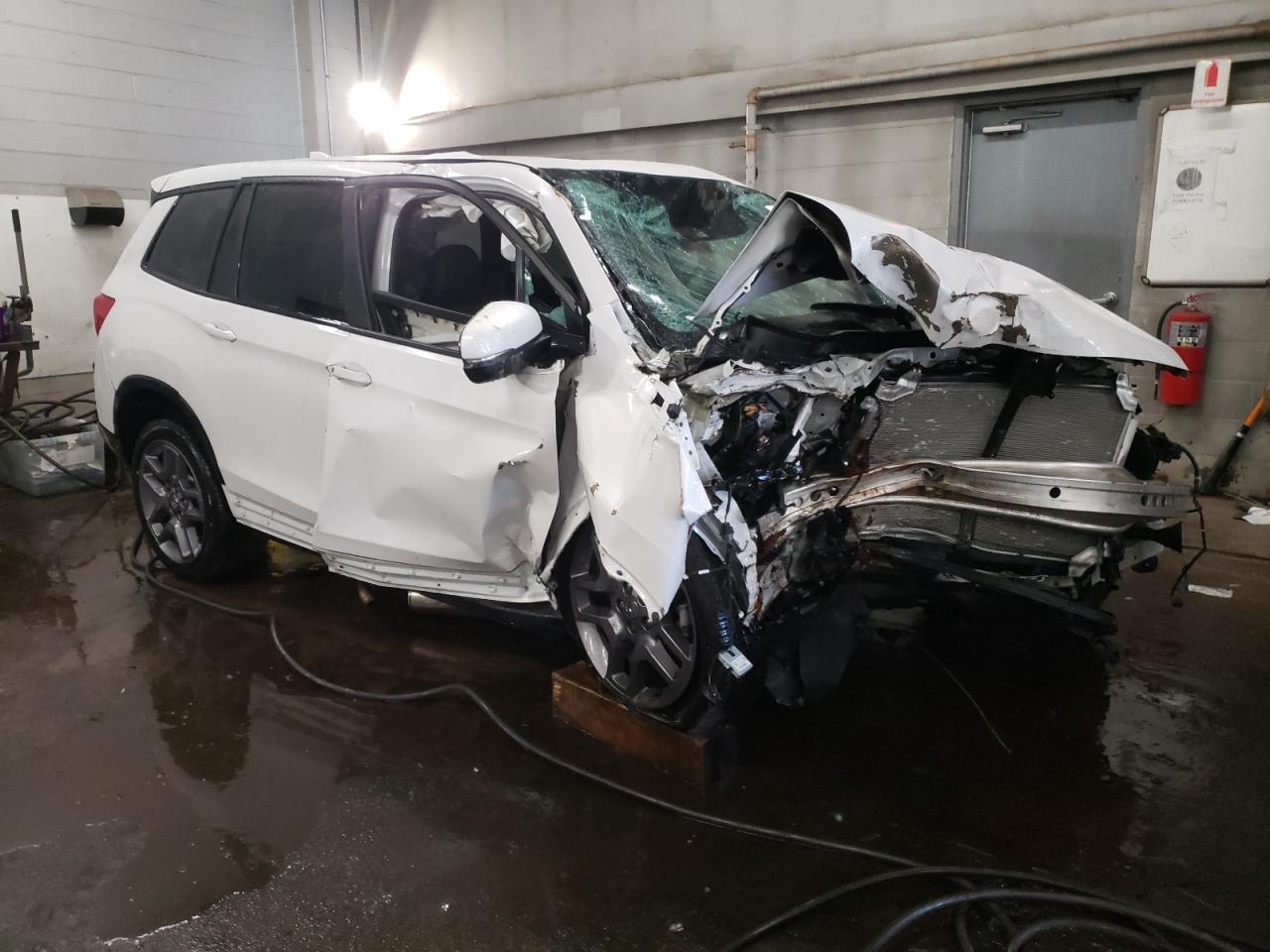 2023 HONDA PASSPORT EXL VIN:5FNYF8H52PB024554