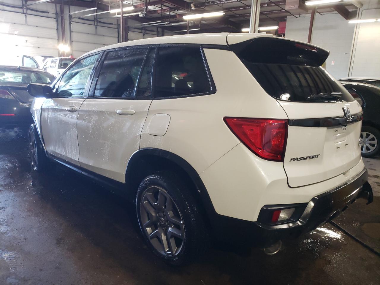 2023 HONDA PASSPORT EXL VIN:5FNYF8H52PB024554