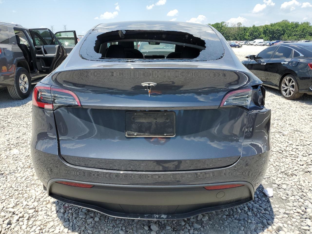 2023 TESLA MODEL Y  VIN:7SAYGDED9PF935176