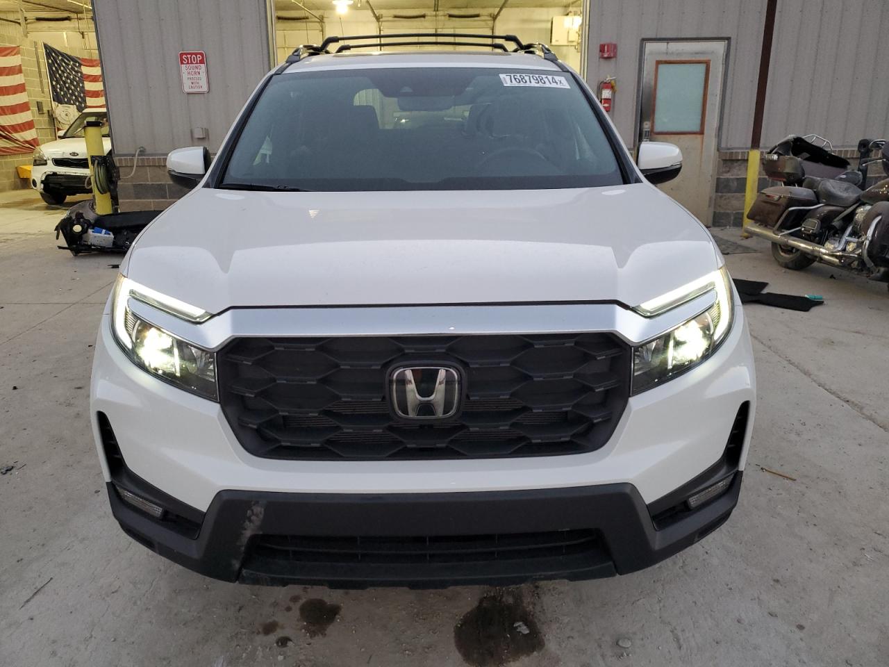 2023 HONDA PASSPORT EXL VIN:5FNYF8H54PB009876