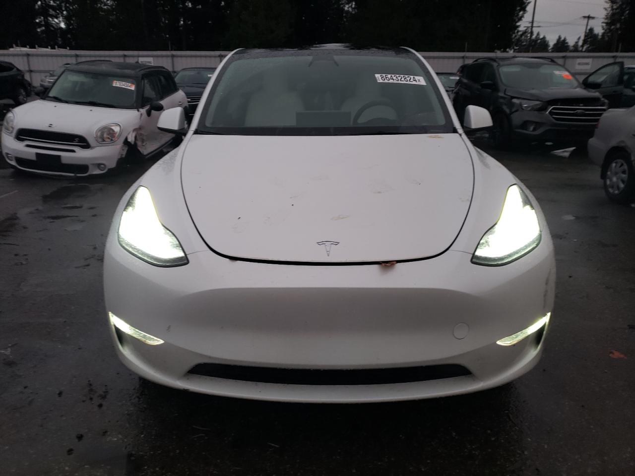 2023 TESLA MODEL Y  VIN:7SAYGAEE4PF599993