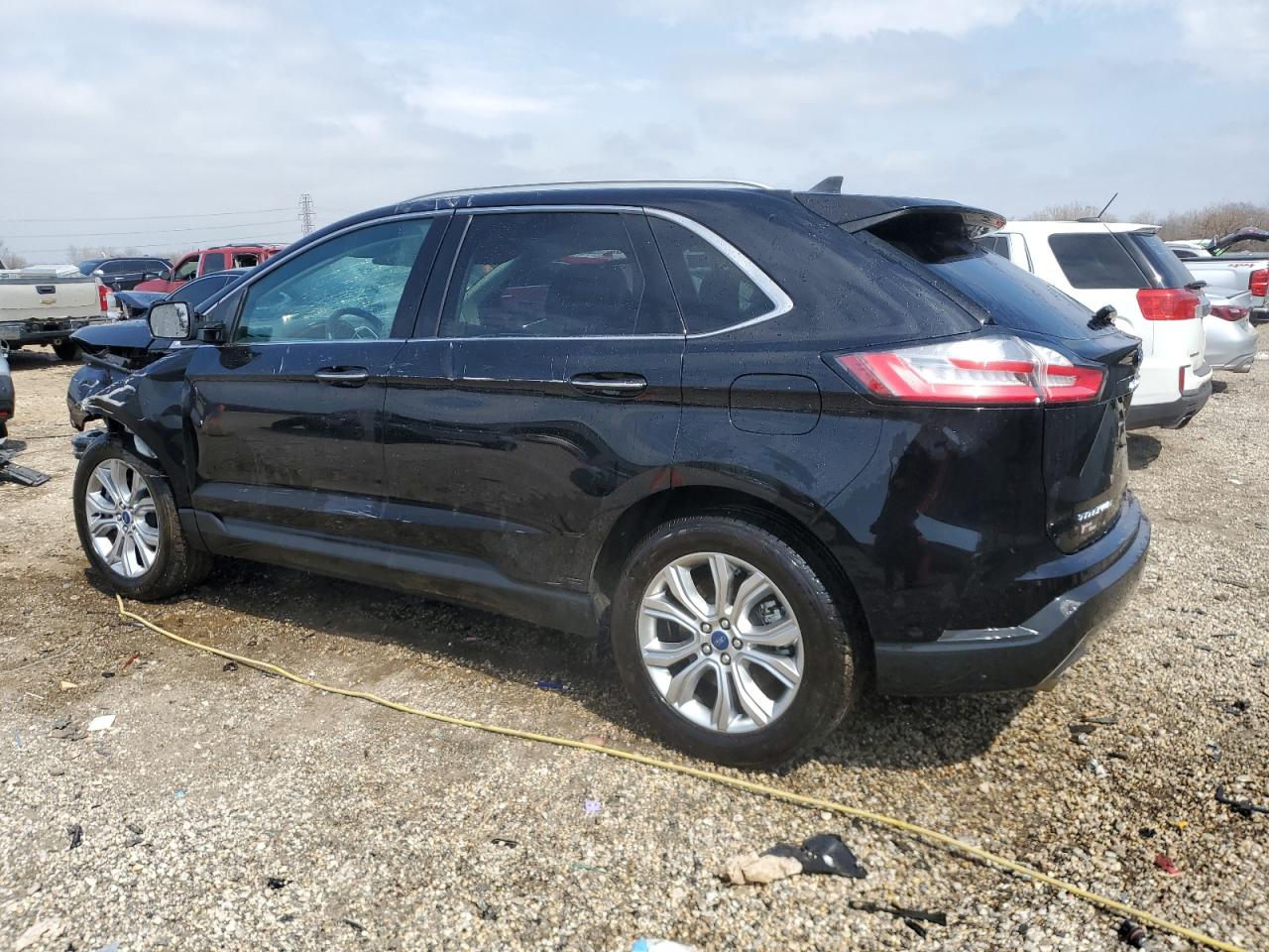 2022 FORD EDGE TITANIUM VIN:2FMPK4K91NBA74220
