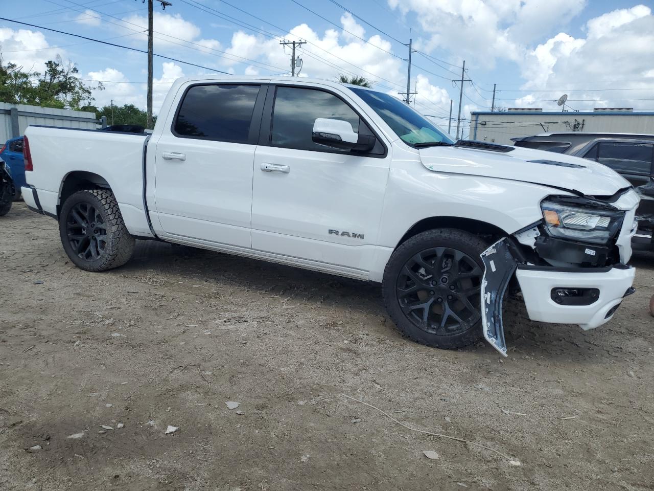 2023 RAM 1500 LARAMIE VIN:1C6SRFJT8PN628483