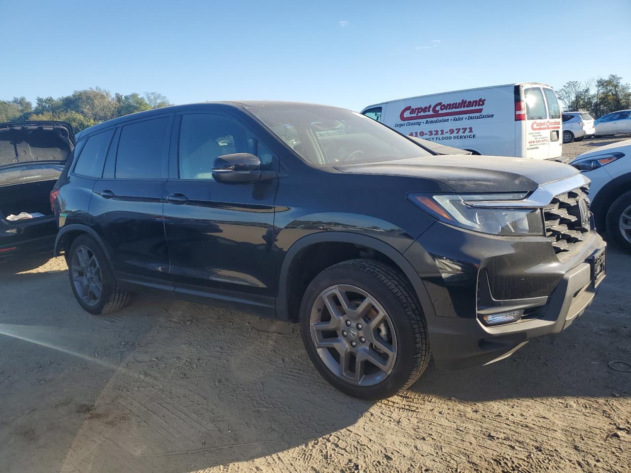 2023 HONDA PASSPORT EXL VIN:5FNYF8H57PB036134