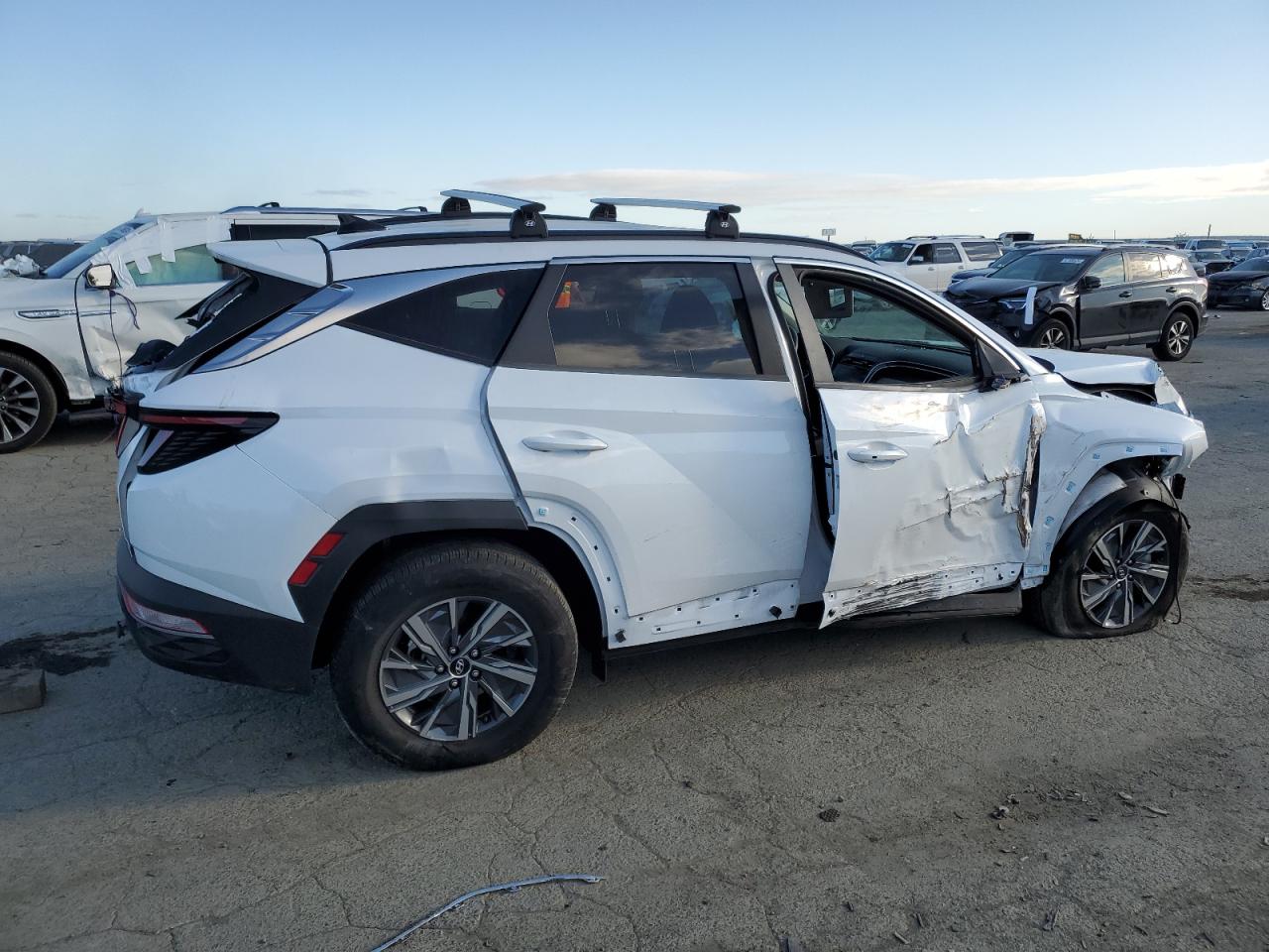 2022 HYUNDAI TUCSON BLUE VIN:KM8JBCA17NU024363