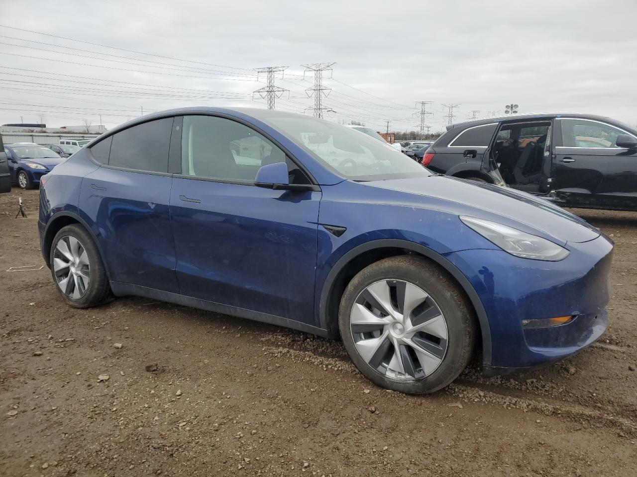 2023 TESLA MODEL Y  VIN:7SAYGDEE7PF703927