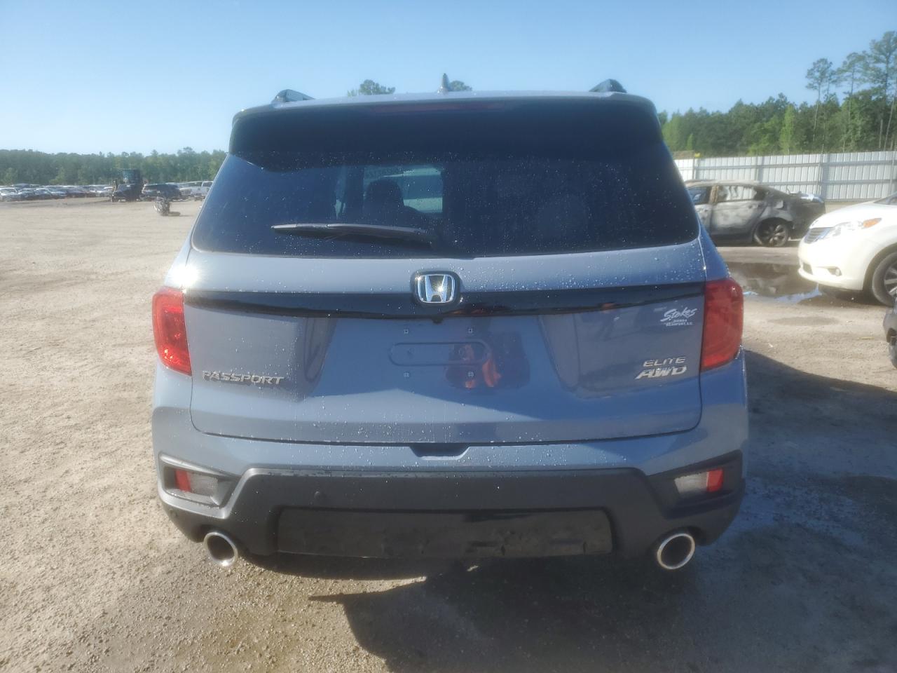 2023 HONDA PASSPORT ELITE VIN:5FNYF8H06PB031446