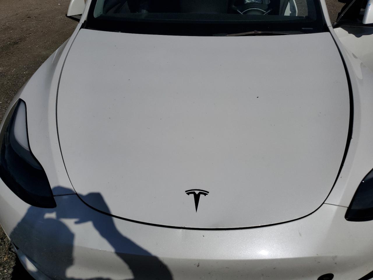 2023 TESLA MODEL Y  VIN:7SAYGDEE0PF695668