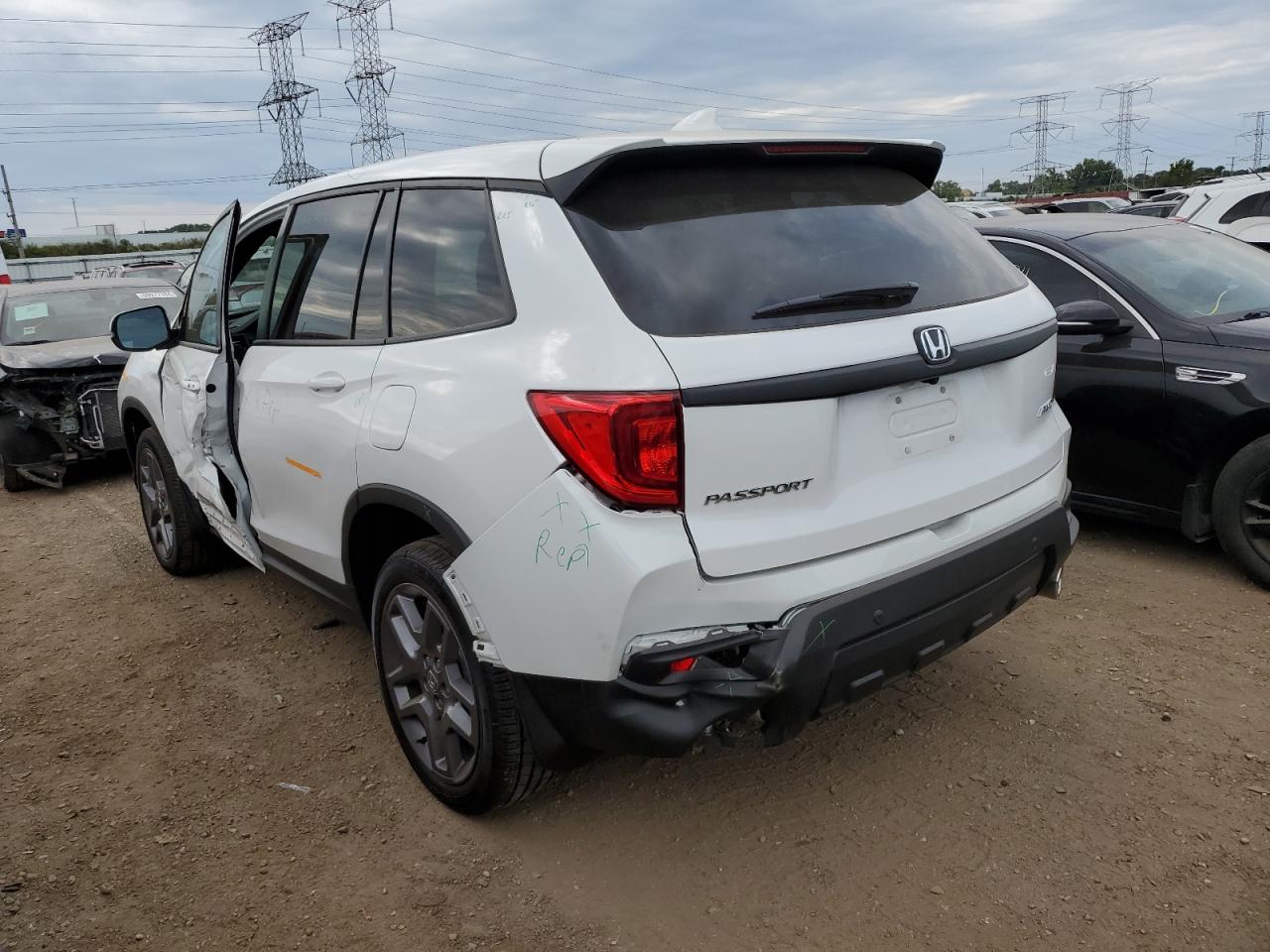 2023 HONDA PASSPORT EXL VIN:5FNYF8H57PB038112