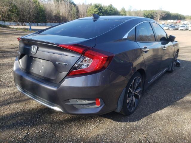 2021 HONDA CIVIC TOURING VIN: 2HGFC1F98MH101240