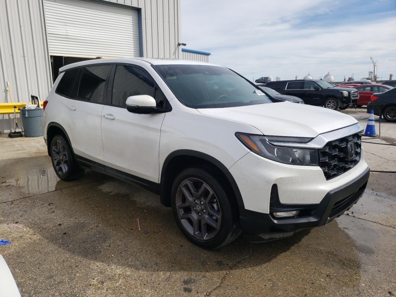 2023 HONDA PASSPORT EXL VIN:5FNYF8H52PB011822