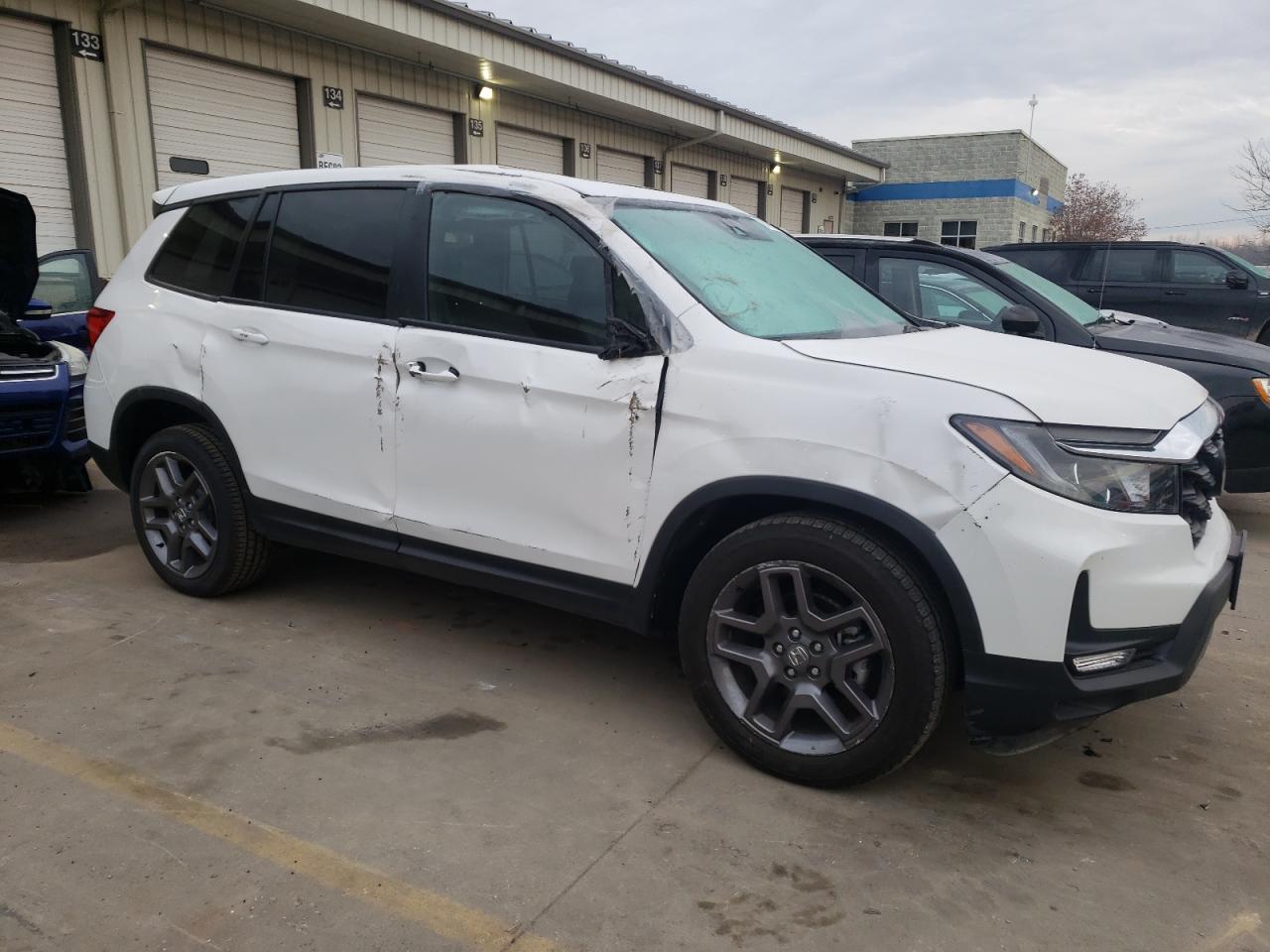 2023 HONDA PASSPORT EXL VIN:5FNYF8H54PB018173