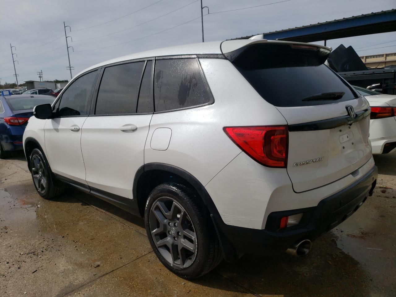 2023 HONDA PASSPORT EXL VIN:5FNYF8H52PB011822