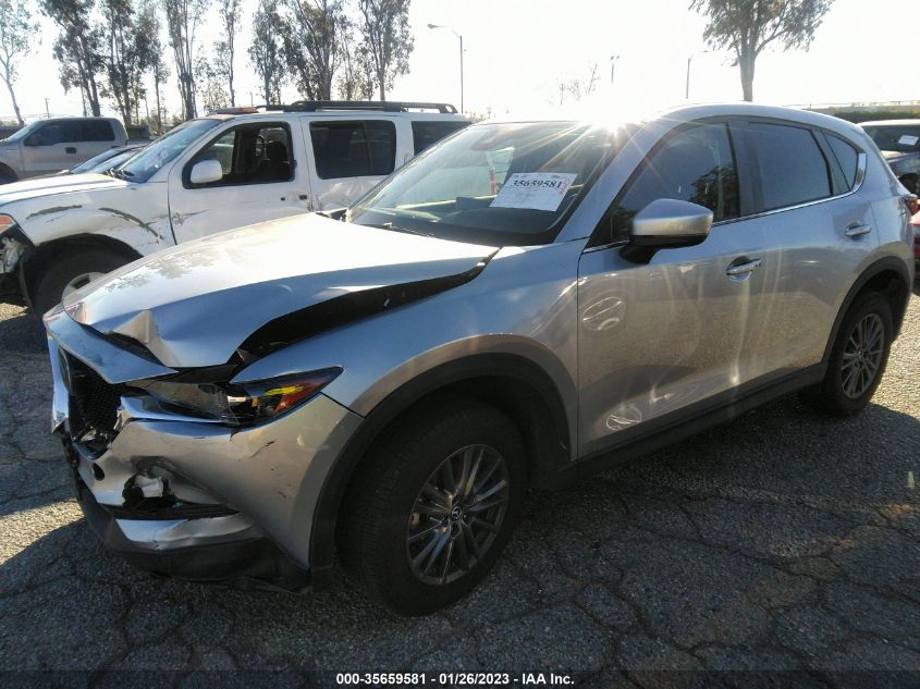 2021 MAZDA CX-5 TOURING VIN: JM3KFBCM0M0447118
