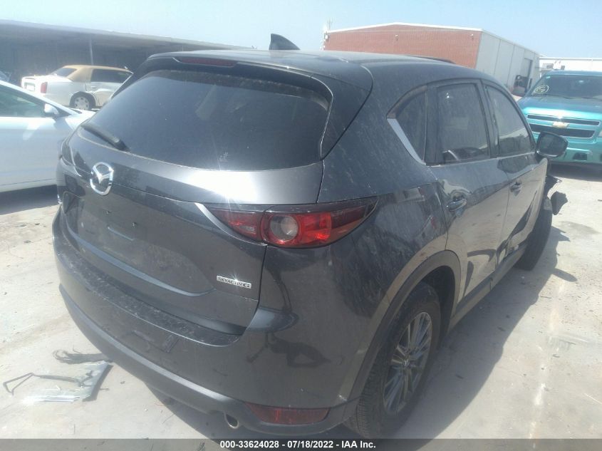 2021 MAZDA CX-5 TOURING VIN: JM3KFACM8M0410621